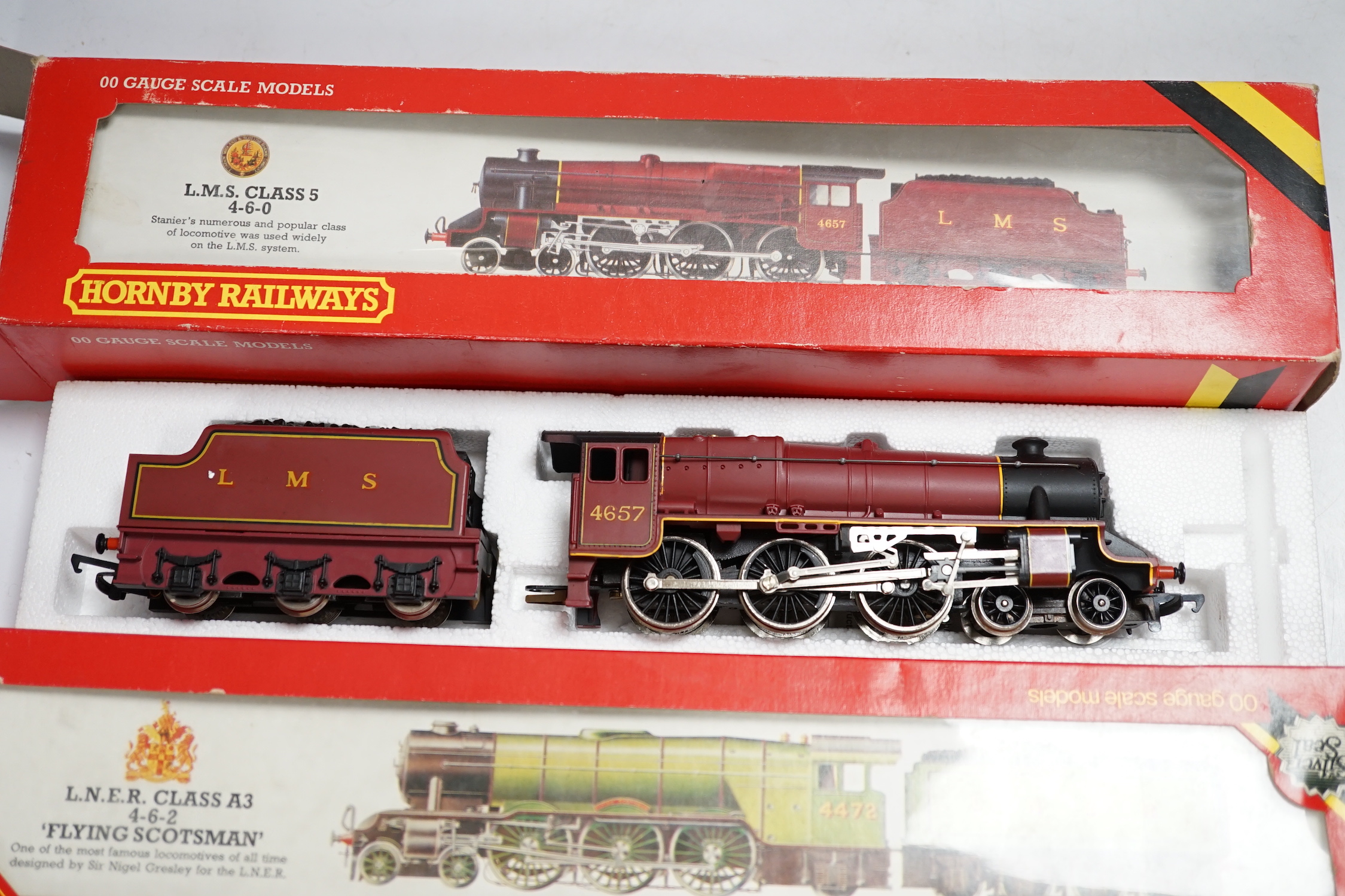 Five boxed Hornby Railways 00 gauge locomotives including; an LMS Black Five (R840), an LMS Class Five (R842), a BR Class 9F (R065), an LNER Class A3 (R 855), and a BR Class 3F (R058)